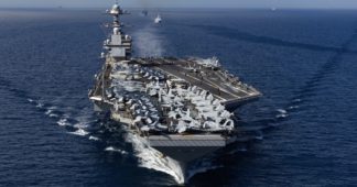 US deploys aircraft carrier and threatens invasion of Venezuela, while expanding “drug” war to Colombia US deploys aircraft carrier and threatens invasion of Venezuela, while expanding “drug” war to Colombia