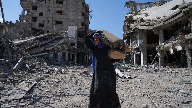 Israel-Hamas ceasefire holds, Palestinians return to north Gaza ruins