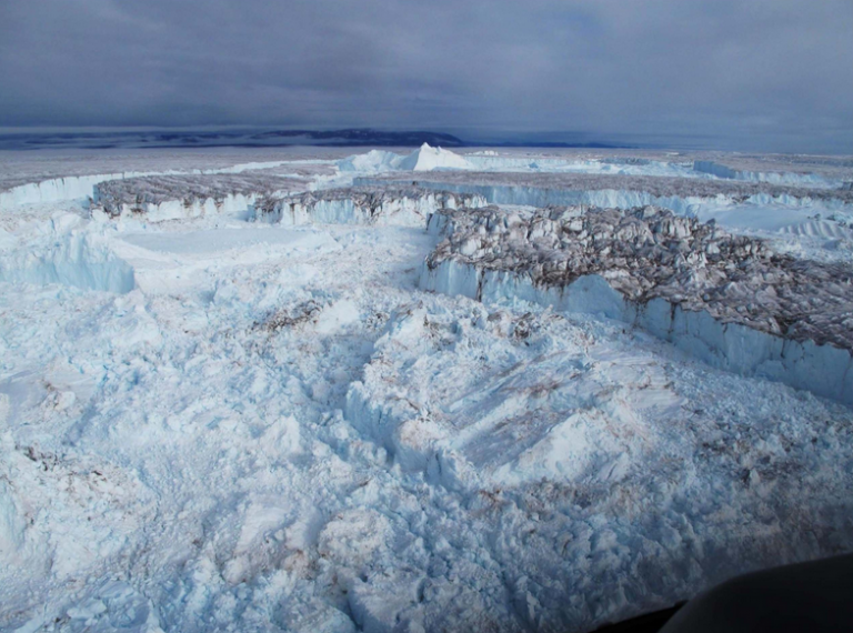 Decreasing cloud cover drives the recent mass loss on the Greenland Ice Sheet