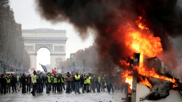 Battlefield Paris: Police hit protesters with tear gas as massive fuel rallies grip France