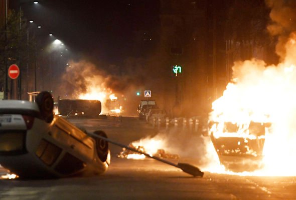 FRANCE IN FLAMES: Rioters torch cars in FOURTH night of violence on streets of Grenoble