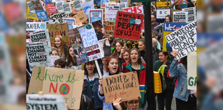 Thousands of students warn May to act on climate change