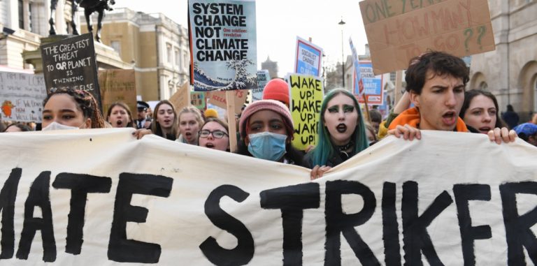 Thousands of kids across Britain take to the streets demanding government fights climate change