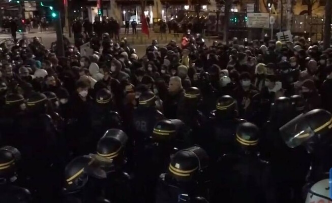 Police use water cannon against protesters in Paris amid clashes over Global Security Bill