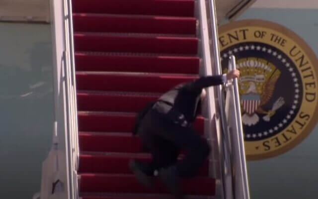 Biden stumbles several times while boarding Air Force One