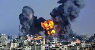 Israel masses forces near Gaza as air strikes continue