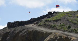 Armenia and Azerbaijan halt clashes after talks with Russian military