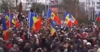Clashes with police during massive anti-government protests in Chisinau, Moldova