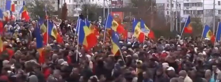 Clashes with police during massive anti-government protests in Chisinau, Moldova