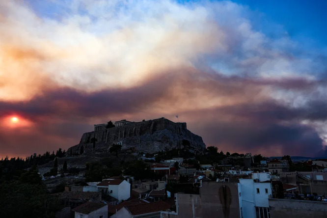 Greek wildfires produce 700km smoke cloud stretching across southern Europe