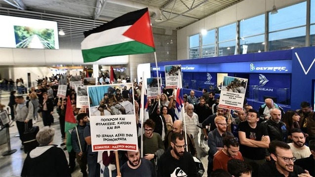 ATHENS AIRPORT: Communist militants protest in favour of Palestine