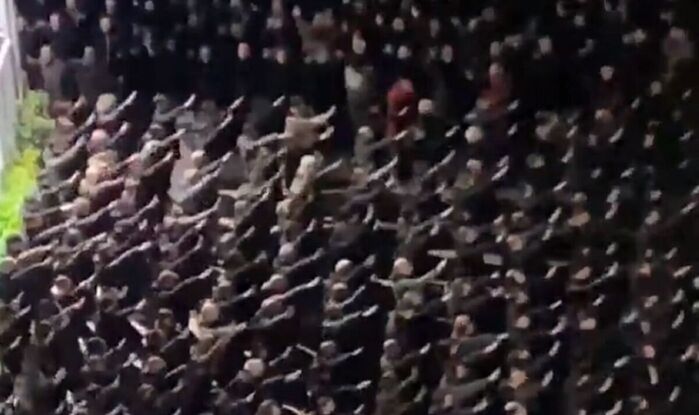 Chilling moment thousands of Italian fascists salute in scenes like WWII