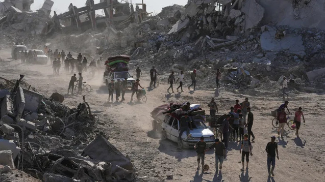 Palestinians search Gaza rubble for loved ones in ceasefire, return home
