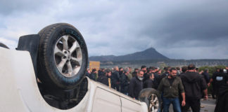 Protesting Greek farmers swarm onto apron area of international airport on Crete