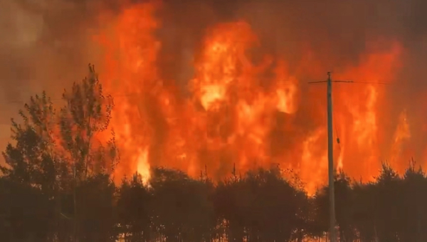 Climate-Driven Wildfires Sweep Across Canada